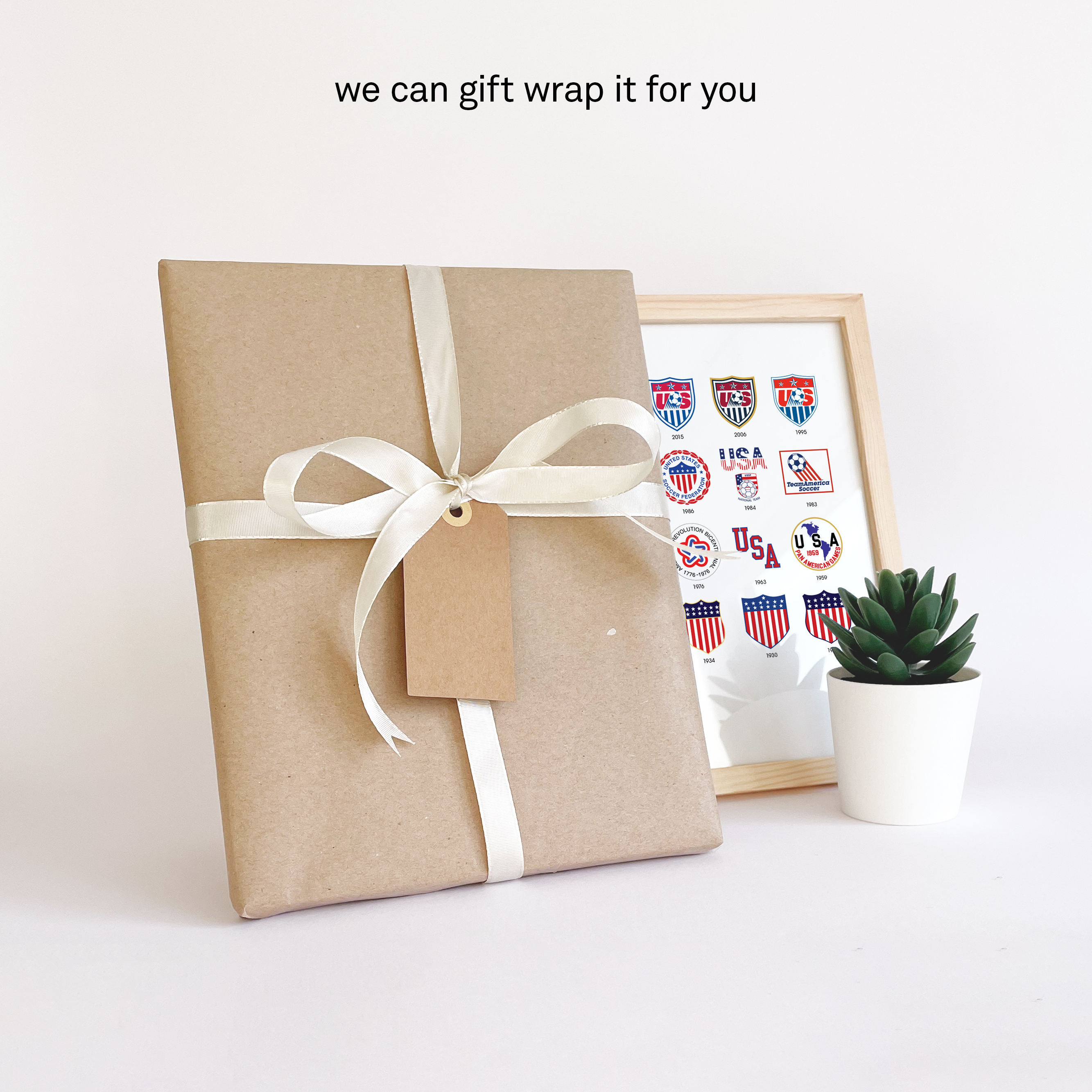 USA Logo History print giftwrapped in brown durable paper with a white ribbon and a personal note card so you can send it directly to that special person